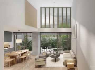 Sala y comedor a doble altura · Departamento con Jardín en Venta de 145 m² en Miraflores Zona Huaca Pucllana