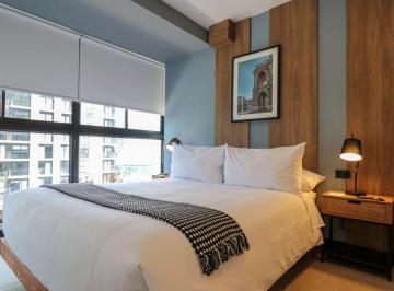 Departamento de 2 habitaciones, Lima · Depa Ejecutivo en El Corazón de San Isidro | 67 m² · 2 Dorm · Amoblado + Cochera y Depósito
