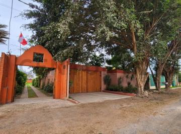 Foto 1 · Casa en Pachacámac 2,390 m² con Piscina – Ideal Para Inversionistas