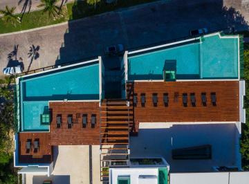 Dos alcercas infinity pool y chapoteadero · Condominio Playa Aurora