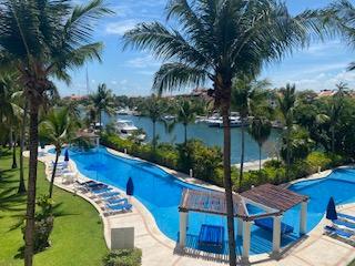 Departamento de 2 habitaciones, Solidaridad · Departamento Puerto Aventuras Vista a La Marina
