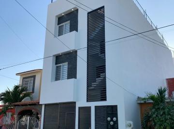 Fachada. Tres niveles, tres departamentos · Departamentos en Venta en Costa Coral Riviera Nayarit