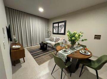 Espacio de sala y comedor, al fondo cortinas de piso a techo · Departamento en Venta Amueblado de 49 m² de 1 Recamara en Sabalo Country