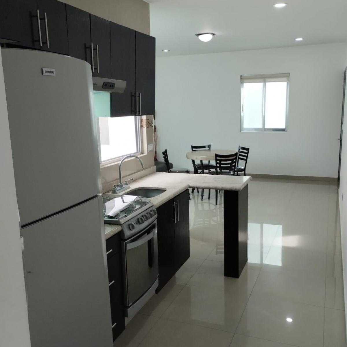 Centrally Located Furnished One-Bedroom Apartment with Utilities Included.