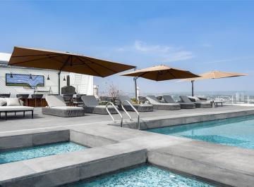 Jacuzzi y alberca · Loft Amueblado con Balcón y Amenidades en The Park