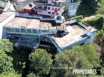 Casa · 297m² · 10 Recámaras · 6 Estacionamientos · Casa con Edificio y Terreno de 1.19 Hectáreas en Huauchinango