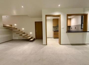 kitchen and stairs to second floor · Estrena Amplio Departamento en La Americana, a 1 Cuadra de Starbucks Chapultepec