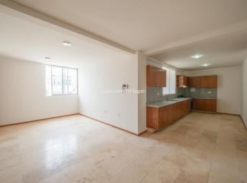 Sala y cocina · Departamento en Venta o Renta en La Paz, Puebla