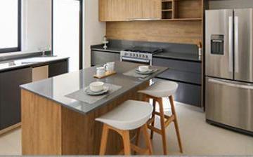 Amplia cocina con isla y cubierta de cuarzo · Casa en Zibatá - Querétaro