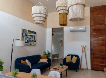 Lamparas de tejido natural en la sala · Casa en Venta en Chelem, Yucatán, a 300 m de La Playa. Amueblada
