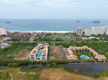 Terreno / Lote · 7149m² · Terreno en Marina Ixtapa 7,149 m² F. a Campo de Golf – Uso Mixto Para Proyecto Residencial/comercial