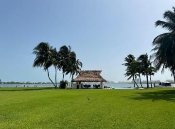 Casa en condominio · 402m² · 3 Recámaras · 4 Estacionamientos · Casa en Venta Isla Dorada Zona Hotelera de Cancún