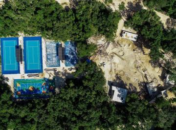 Terreno / Lote · 580m² · Vendo Terreno en Ruta de Los Cenotes Residencial Mukta de 540 m² con 2 Cenotes Exclusivos