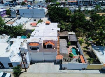 a765920fa466e253dc41f4d771fe03660cfccdec32fa896f974ad0d7ca5a9be9 · Casa en Venta con Amplia Cochera de Doble Altura, Cercana a Marinas