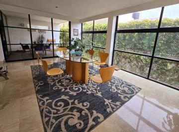 Comedor interior al frente y exterior al fondo · Casa en Condominio en Parte Baja de Las Águilas