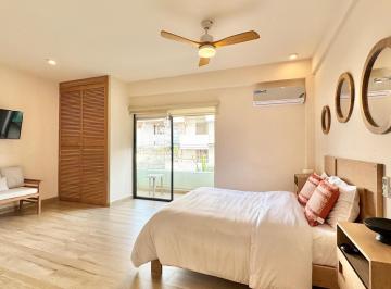 CAMA, SOFA Y TELEVISOR · Departamento en Venta con Alberca con Vista Al Mar 1 Rec. 52 m² en Playa del Carmen
