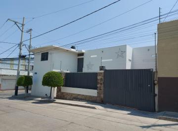 Casa · 405m² · 5 Recámaras · 1 Estacionamiento · Casa Comercial con Locales Lomas de La Trinidad