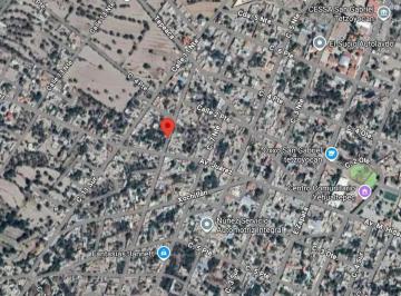 1 · Terreno Urbano de 698 m² con Construcción en Tetzoyocan