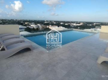 Departamento · 55m² · 1 Estacionamiento · Departamento en Venta en Playa del Carmen, con Balcón, Piscina, y Gimnasio.