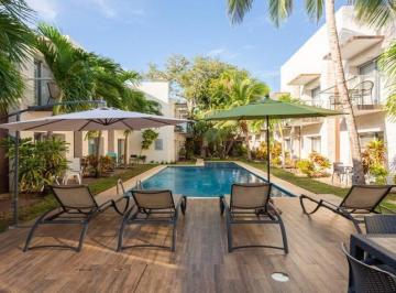 un area de asoleadero para residentes en condominio akab playacar · Departamento en Renta 1 Recamara - Condominio Akab Playacar Playa del Carmen