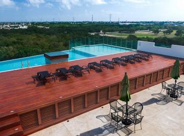 una vista aerea de una alberca en playa aurora playa del carmen · Departamento 2 Recamaras en Renta Playa Aurora, Playa del Carmen