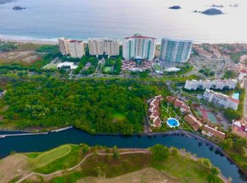 Terreno / Lote , Zihuatanejo de Azueta · Terreno Plano Frente Al Canal de Navegación en Marina Ixtapa – Uso Habitacional y Comercial