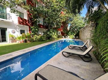 Departamento · 117m² · 2 Recámaras · 2 Estacionamientos · Amplio Departamento en Venta en Cancún Centro 2 Recámaras con 2 Estacionamientos Techados y Alberca