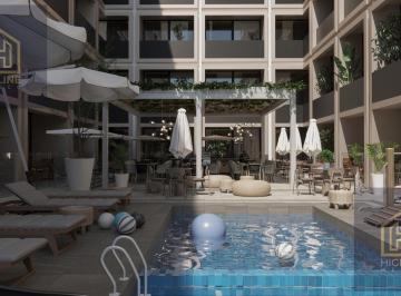 Departamento · 19m² · 1 Estacionamiento · Estudio Tipo Suite en Venta en El Centro de Playa del Carmen, Alberca, Cine, Rooftop.