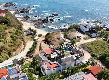 Inmueble productivo urbano , San Pedro Pochutla · Hotel y Terreno con Orilla de Playa en Venta