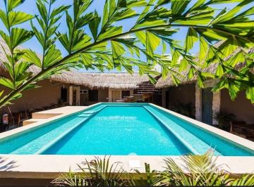 271b8e56fc58e5f7f5b0619fd6127406c5babb70b0feec1dc961d35f364a4be7 · Hotel en Venta en Tulum Centro de 24 Habitaciones y 3 Locales Comerciales