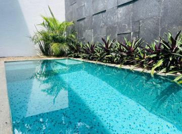 Casa en condominio · 325m² · 4 Recámaras · 2 Estacionamientos · Casa Moderna de 4 Recámaras, Una en Planta Baja, Sala con Doble Altura en Playa del Carmen