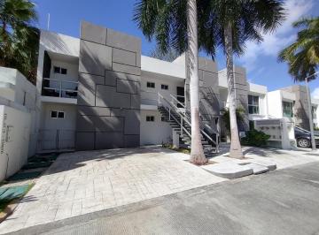 una fachada de un edificio de departamentos en condominio anemonas playacar · Estudio en Venta en Condominio Anemonas Playa del Carmen