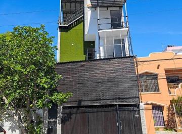 EDIFICIO · Oportunidad Única en Playa del Carmen: Edificio Comercial con Hostal y Roof Top Bar
