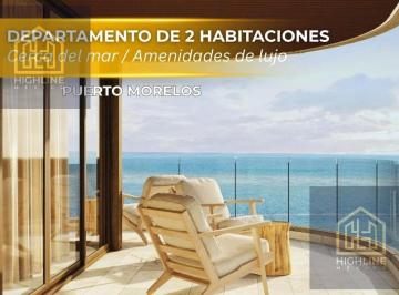 Departamento · 116ha · 2 Recámaras · 2 Estacionamientos · Lujoso Departamento de 2 Habitaciones Frente Al Mar en Puerto Morelos con Rooftop
