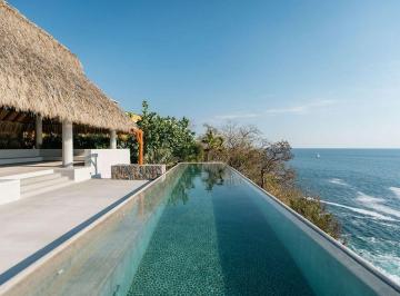 626c9bfa0bef1cca6692d1d4dc050e794f712bdf6c0565402339d424eeba8391 · Casa con Vista Al Mar en Venta, Exclusiva en Punta Garrobo Zihuatanejo