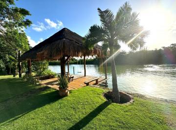 Casa · 615m² · 4 Recámaras · 1 Estacionamiento · Casa 4 Recámaras en Venta con Jardín Tropical, Frente a Laguna, Cancún