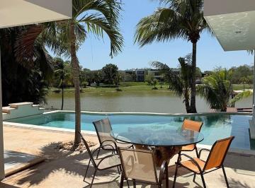 bd6304f9af1ce5738cdb09faed93d263e0433f5c13fbe95f671f2b40d9508026 · Venta Residencia con Vista Al Cenote Dentro del Yucatan Country Club.