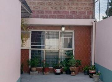 Entrada Principal · Casa con Local Comercial