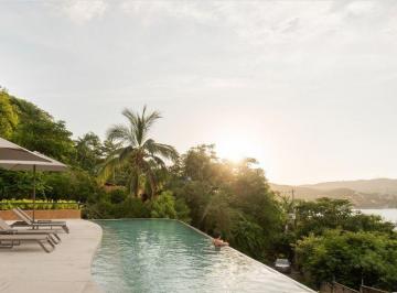 2352eee2b445f2ff1c636e321cab6ad73b3e0438ff04bbd42d0658355679aa2a · Villa en Venta en Zihuatanejo Playa Las Gatas, Armadillo Living