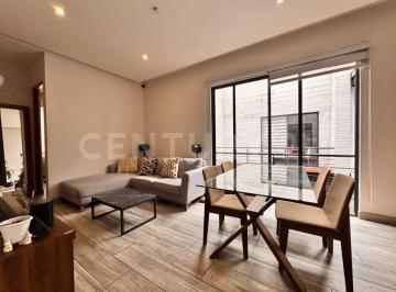 Comedor y sala con balcón · Departamento con Roof Garden Privado en Nápoles | Amenidades Premium