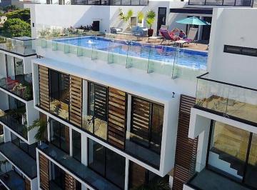 Departamento · 121m² · 2 Recámaras · 1 Estacionamiento · Tu Refugio en El Caribe: Moderno 2br en El Corazón de Playa