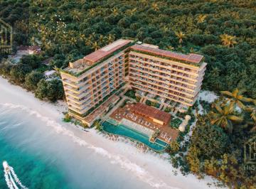 Departamento · 68m² · 1 Recámara · 1 Estacionamiento · Penthouse en Venta en Puerto Morelos 1 Habitación con Bar, Spa, Alberca Frente Al Mar