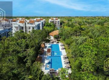 Departamento · 79m² · 2 Recámaras · 1 Estacionamiento · Departamento en Venta en Puerto Morelos de 2 Habitaciones Entrega Inmediata con Albercas y Cancha