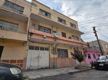 Edificio · 444m² · 9 Recámaras · 2 Estacionamientos · Edificio en Venta Para Remodelar con Nueve Viviendas Ideal Para Familias Grandes o Inversionistas