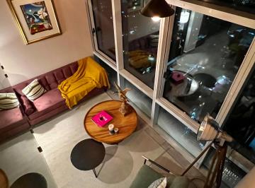 Sala vista desde el tapanco · Departamento Ejecutivo Doble Altura con Vista Increible.