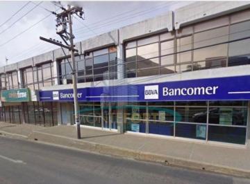 Edificio · Edificio Comercial en Aguila