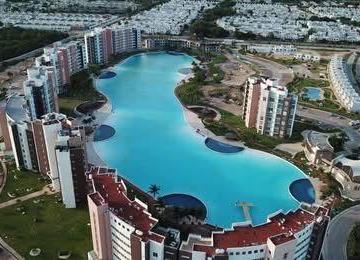 Departamento · 74m² · 2 Recámaras · 2 Estacionamientos · Departamento en Venta en Exclusivo Residencial Dreams Lagoons, Cancún