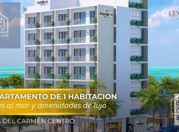 Departamento · 57m² · 2 Recámaras · 1 Estacionamiento · Departamento de 2 Habitaciones a Pasos del Mar con Amenidades de Lujo en Playa del Carmen Centro