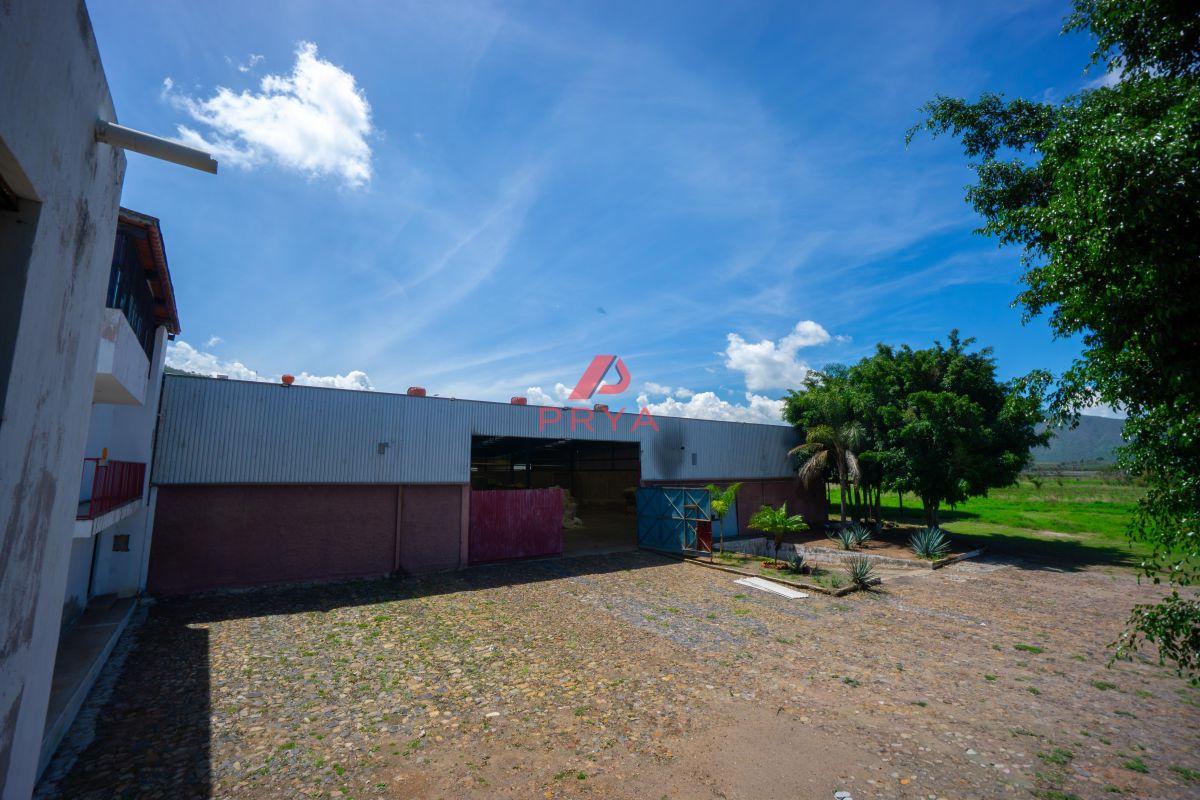 Commercial Land for Sale with Warehouse in Acatlán de Juárez, Adjacent to Highway