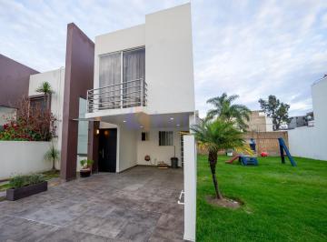 Fachada y area verde · Casa en Venta en Santiago Momoxpan, Puebla